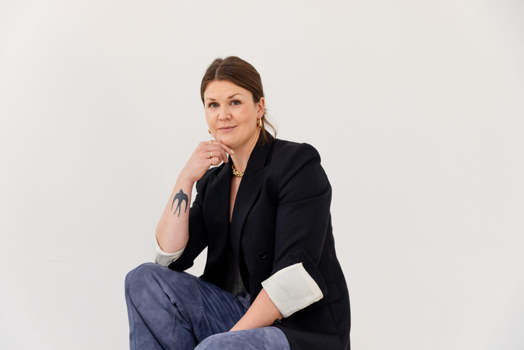 Brand photography session in Stockholm for psychologist Josephine. See how studio portraits, styling, and brand colors created authentic personal branding images.